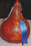 Davids ribbon winning gourd, carved with his new tools